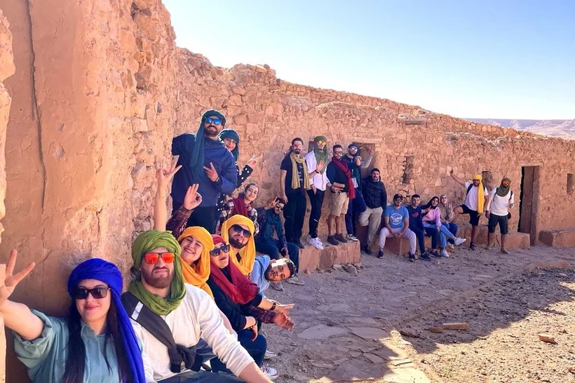 A Tourago group at the foot of the ksar walls at Brezina