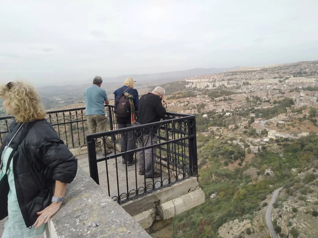 Travellers at a viewpoint above the gorge, beside the bridge at Constantine